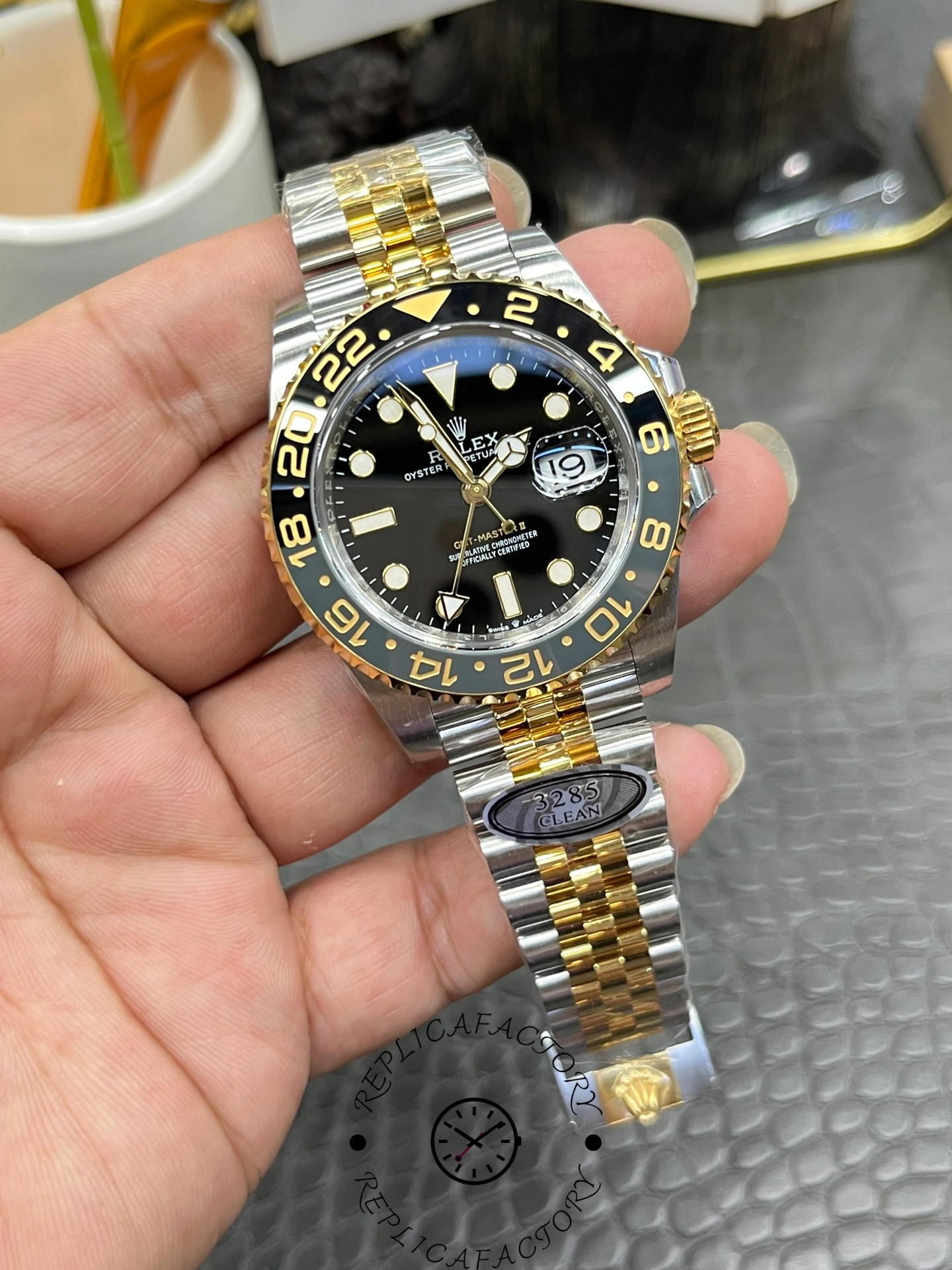 Wrist shot of Rolex GMT-Master II 126713GRNR-0001 showing luxurious two-tone style.