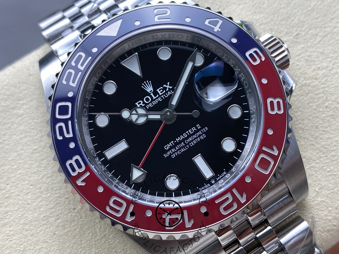Close-up of Rolex GMT-Master II 126710BLRO highlighting bezel numerals and cyclops lens over date.