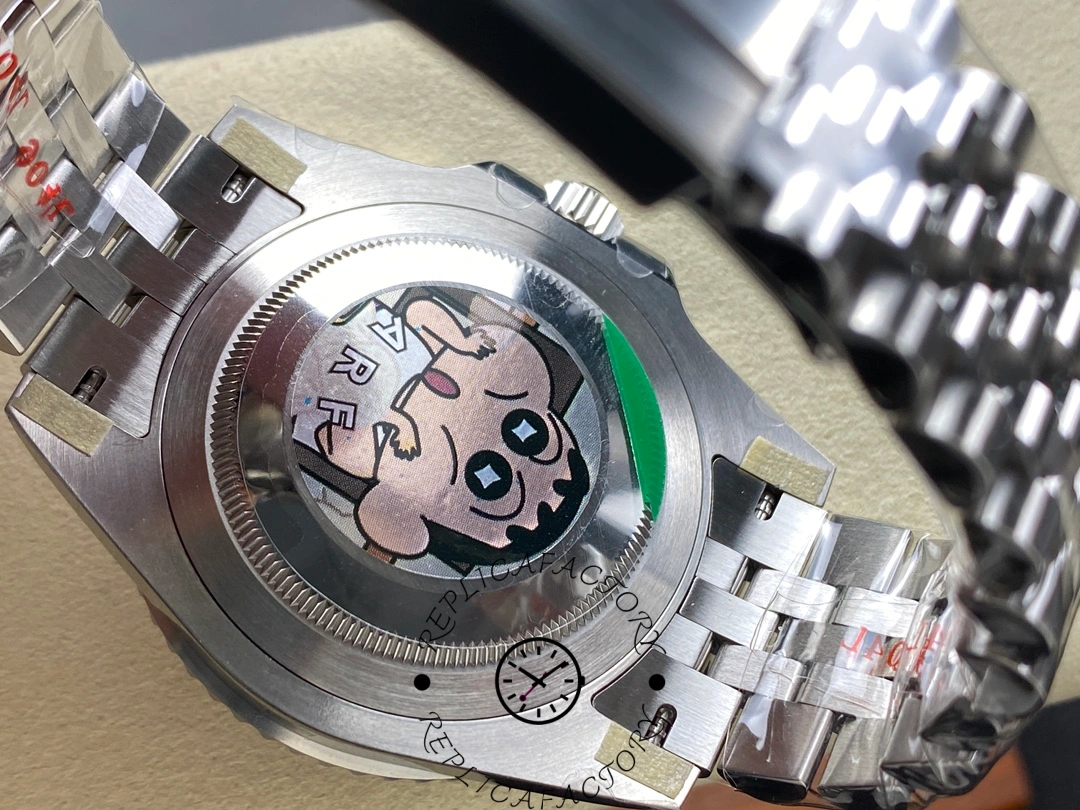 Caseback of Rolex GMT-Master II 126710BLRO featuring YRF cartoon sticker and brushed steel finish.