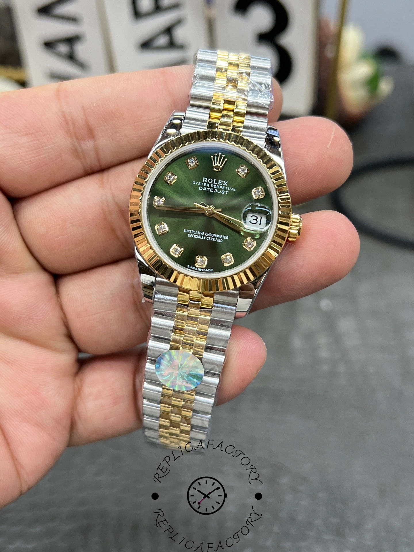 Full front shot of ReplicaFactory Rolex Datejust 31mm 278273-0030 showing two-tone Jubilee bracelet.
