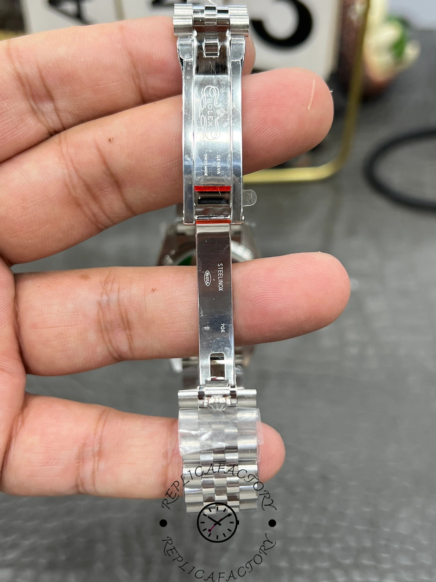 Inside clasp engraving of ReplicaFactory Rolex Datejust 31mm 278274-0026 with Rolex Geneva Swiss Made markings.