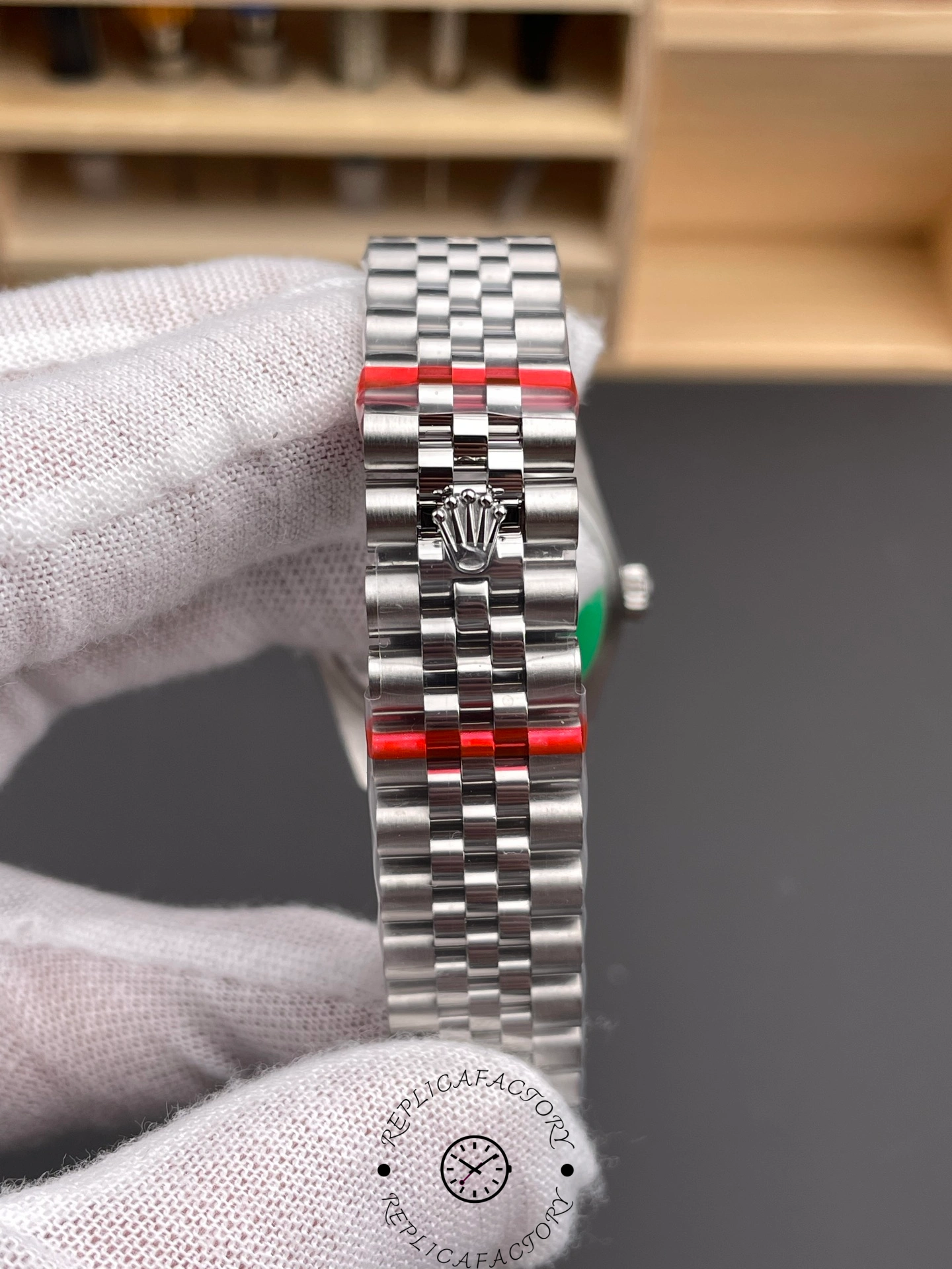 Clasp view of Rolex Datejust 31 m278384rbr 0036 jubilee bracelet with Rolex crown logo.