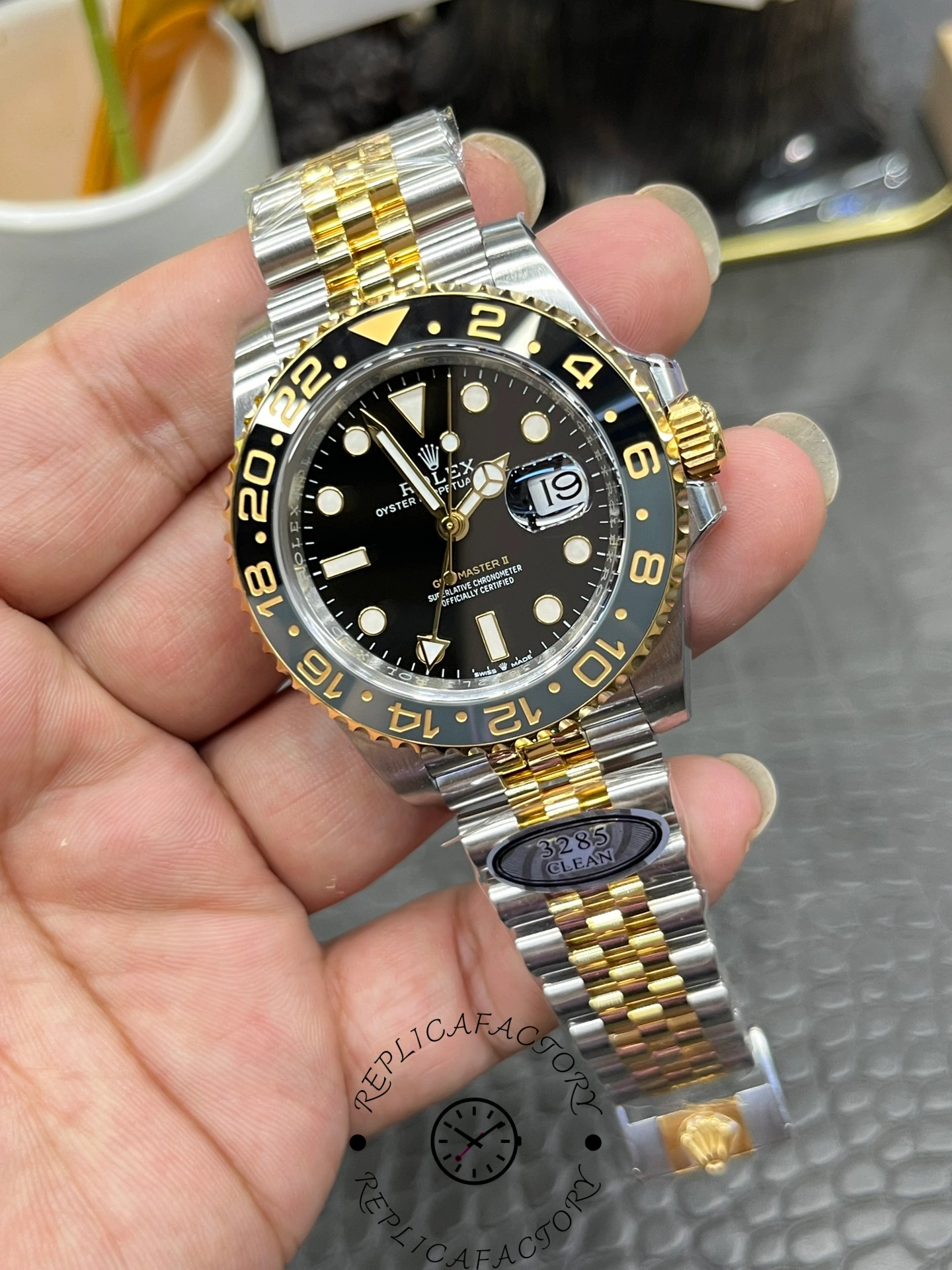 Caseback of Rolex GMT-Master II 126713GRNR-0001 showing engraved text and polished steel.