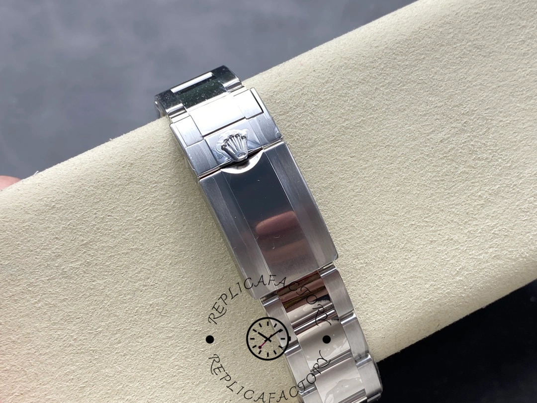 Bracelet clasp of Rolex GMT-Master II 116710BLNR showing engraved Rolex crown.