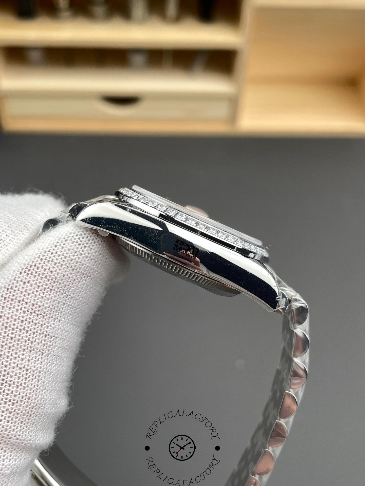 Right side view of Rolex Datejust 31 m278384rbr 0036 with diamond bezel and steel finishing.