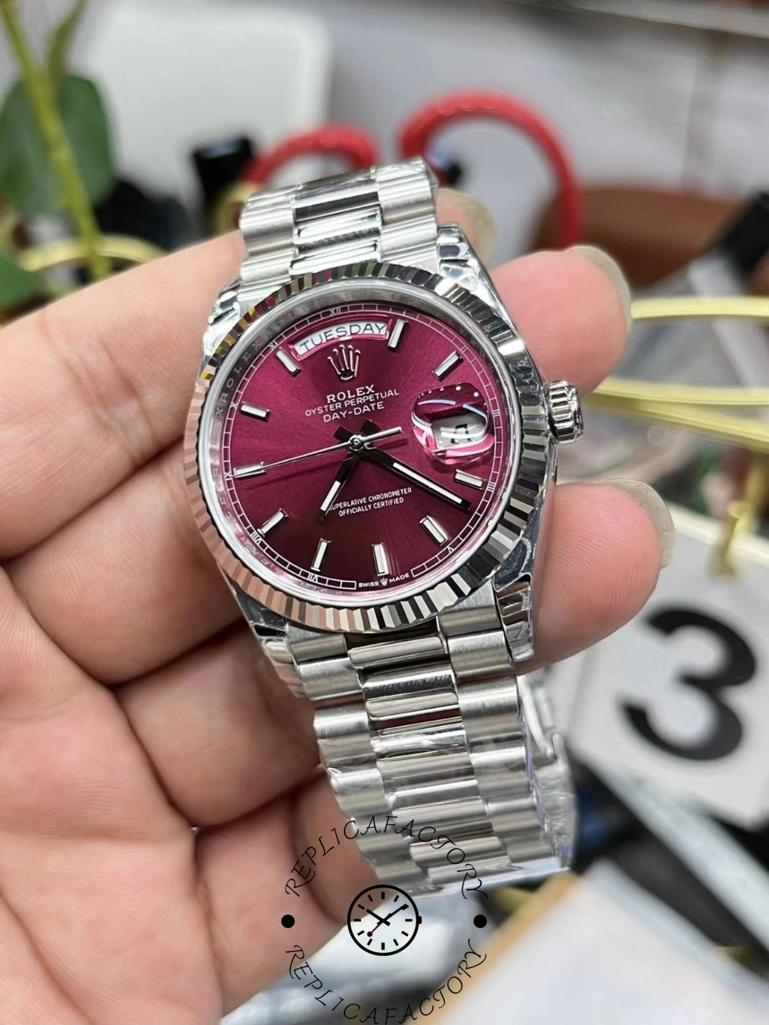 Rolex Day-Date 118239 red dial side view with polished case and crown