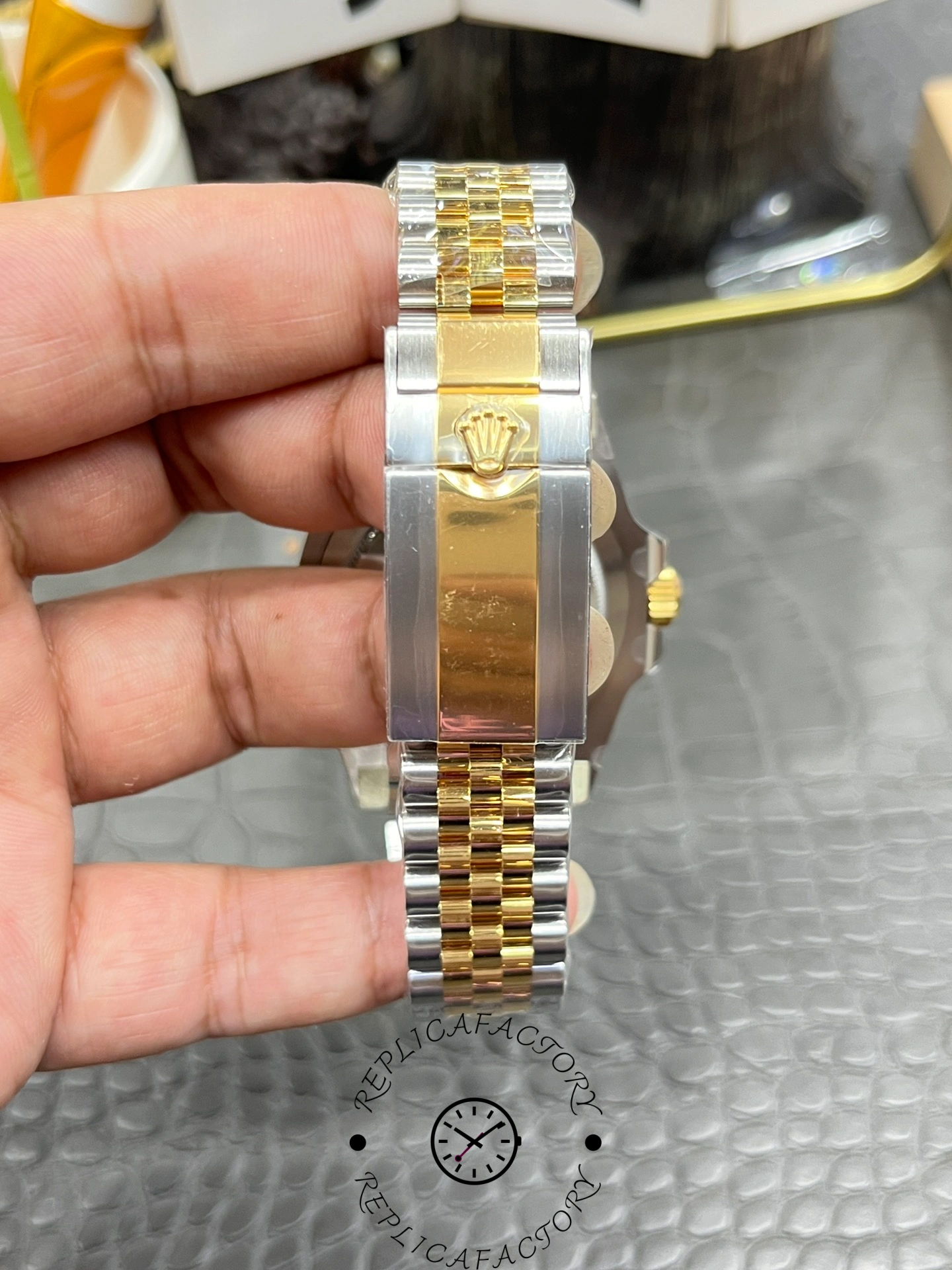 Clasp view of Rolex GMT-Master II 126713GRNR-0001 with engraved Rolex crown logo.