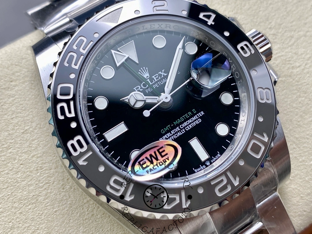 Close-up of Rolex GMT-Master II M126710GRNR-0004 black dial and ceramic bezel.