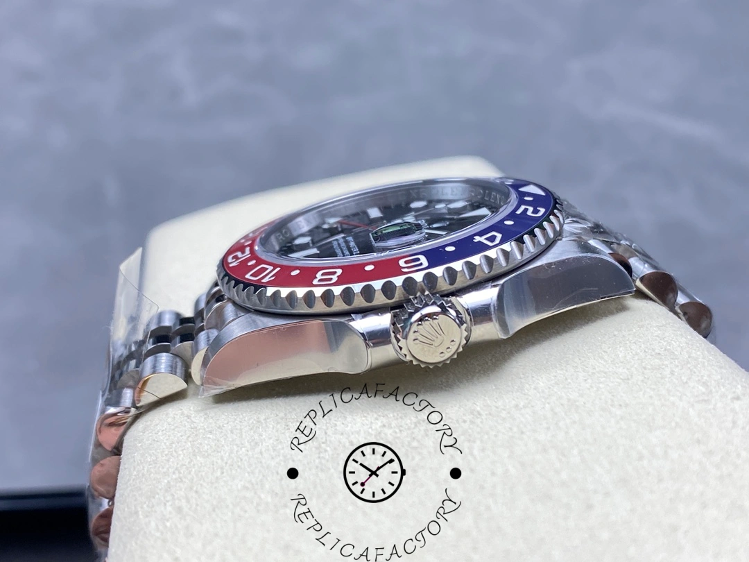 Crown side of Rolex GMT-Master II 126710BLRO showing Rolex crown logo and bezel edge.