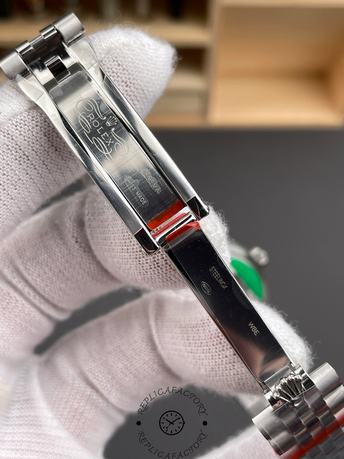 Inside clasp engraving of Rolex Datejust 31 m278384rbr 0036 showing Geneva mark and steel code.