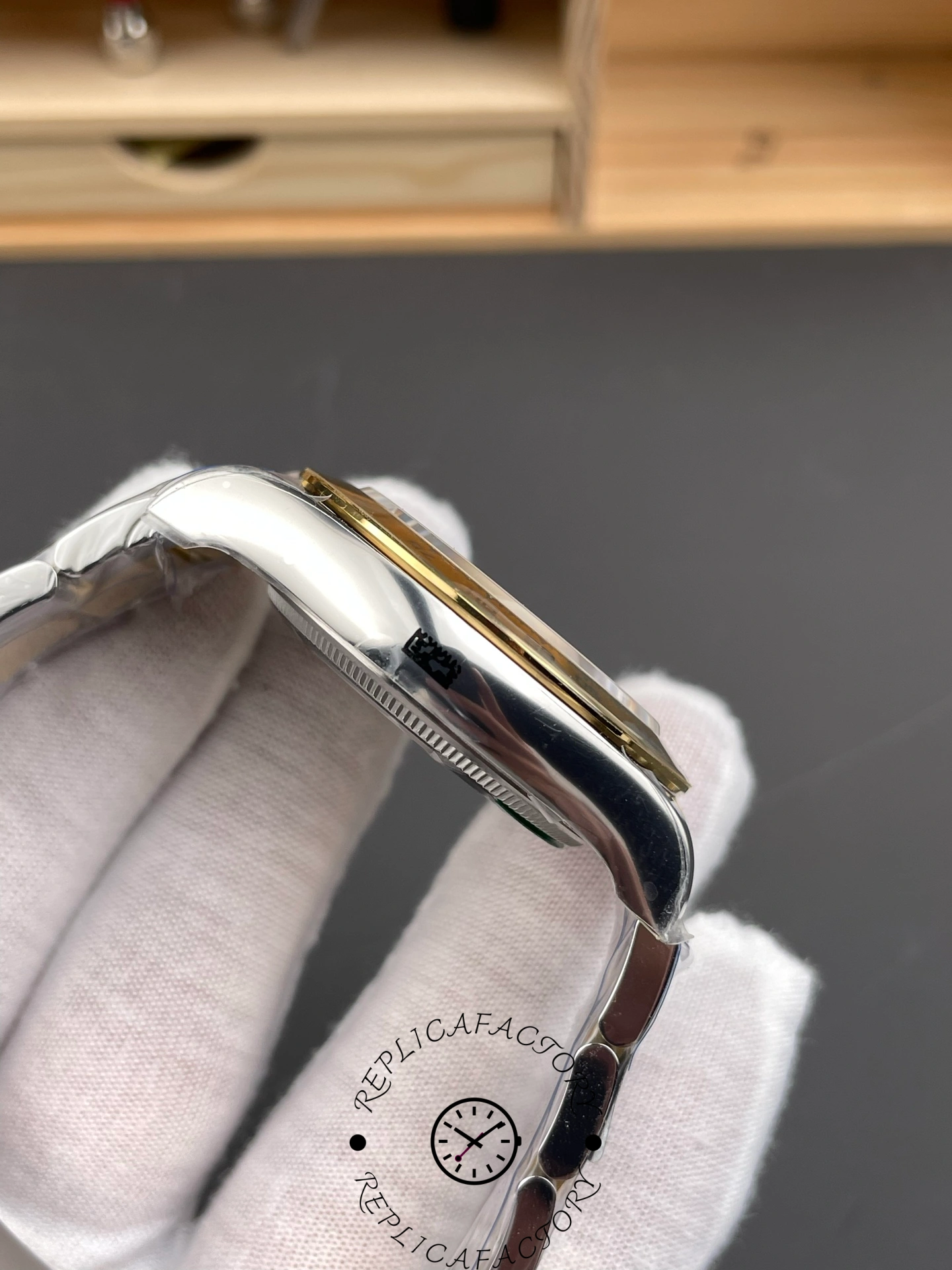 Side profile of Rolex Daytona 126503-0002 with polished steel case.