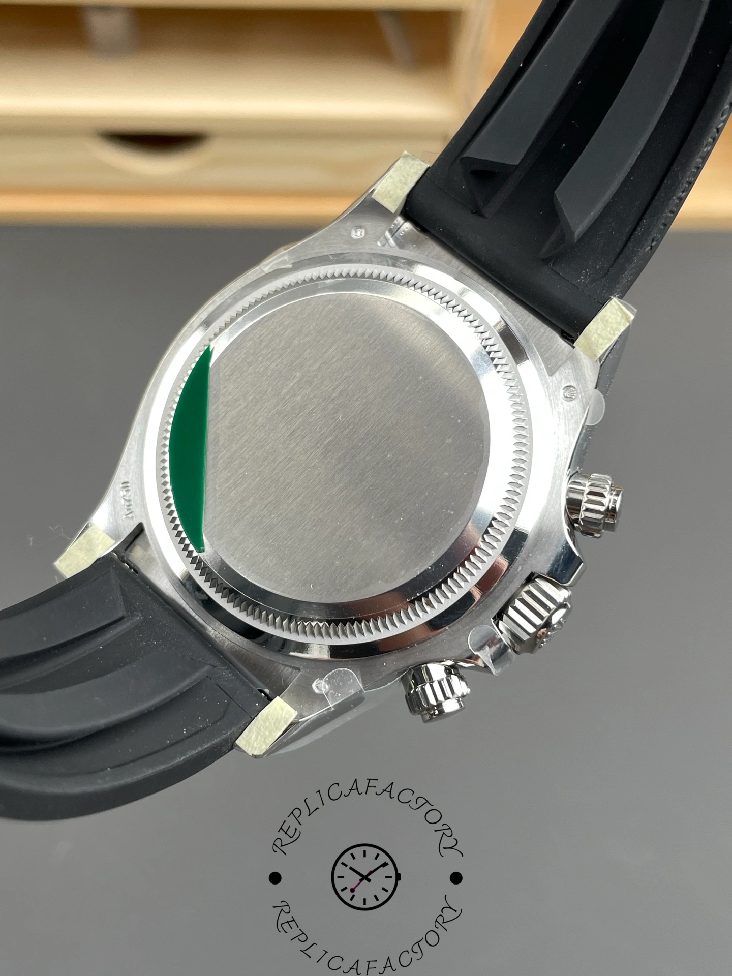 Caseback of Rolex Daytona 126519LN showing brushed steel back and Oysterflex strap attachment.