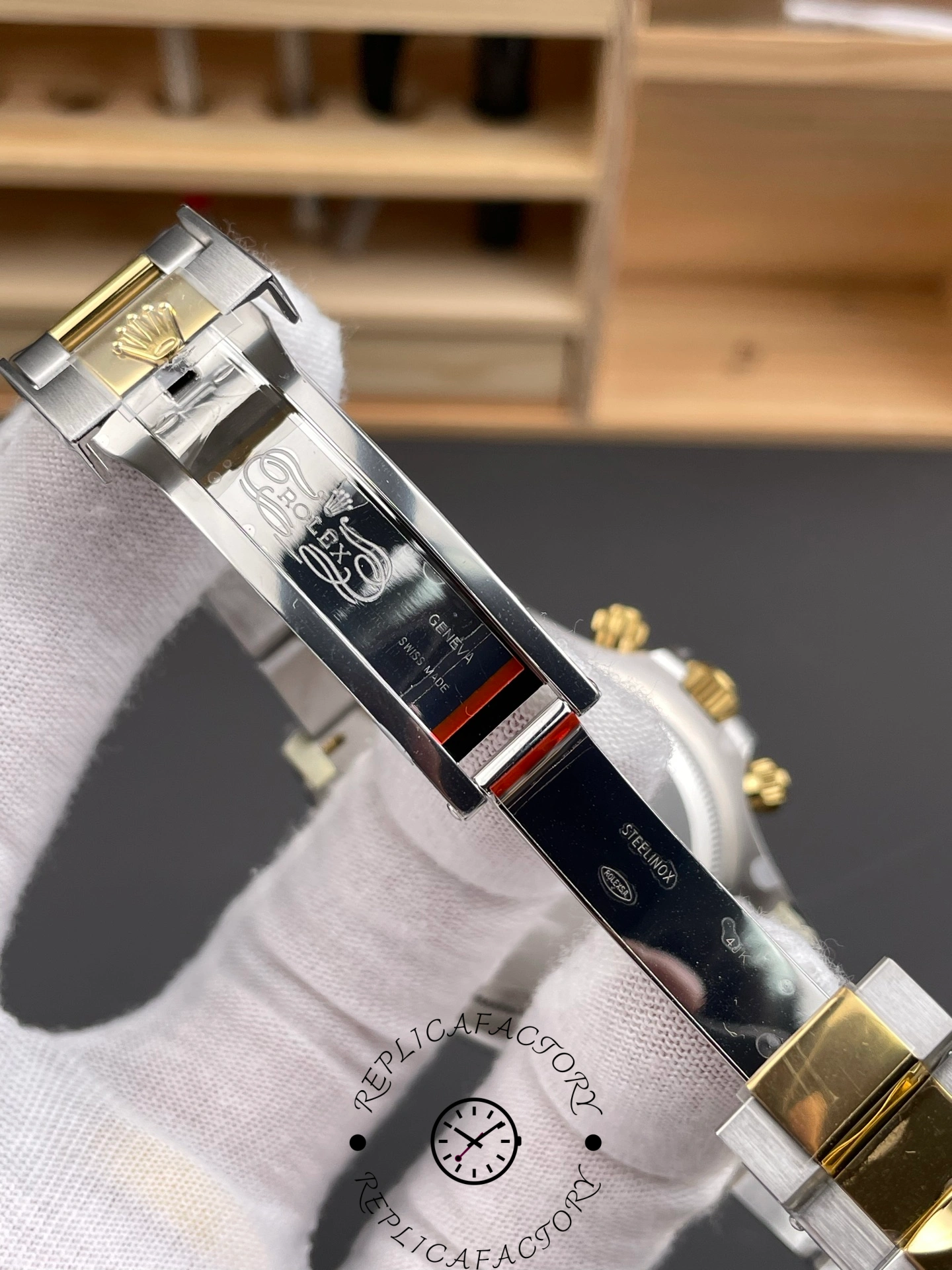 Inner clasp engraving of Rolex Daytona 126503-0002 showing logo and Swiss Made mark.