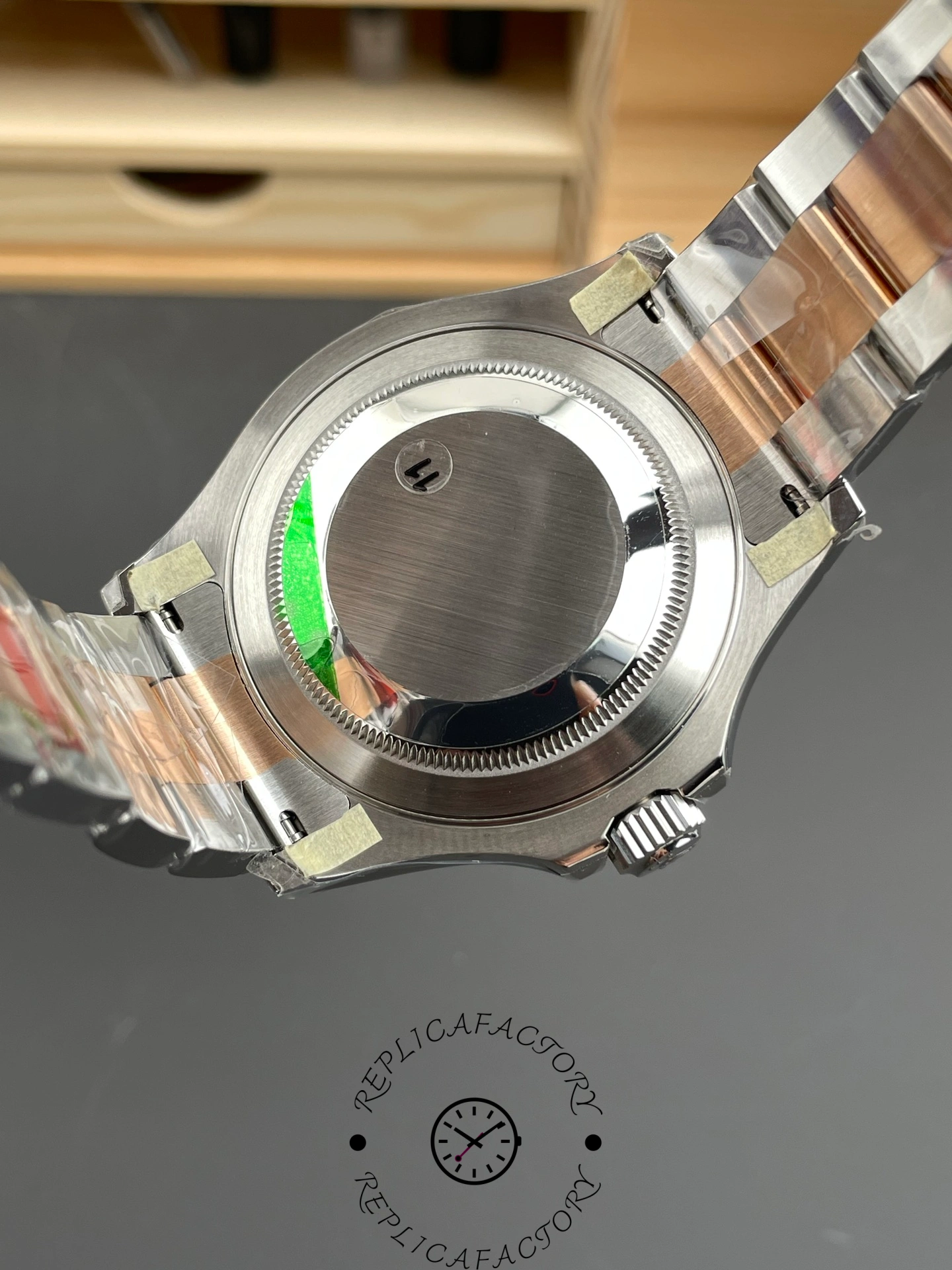 Caseback of Rolex Yacht-Master 126621 showing brushed steel back with Everose bracelet links.
