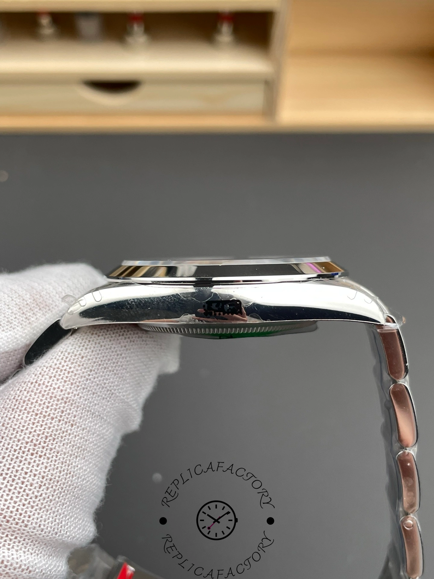 Left side of Rolex Explorer 224270 showing case curvature and polished edge.