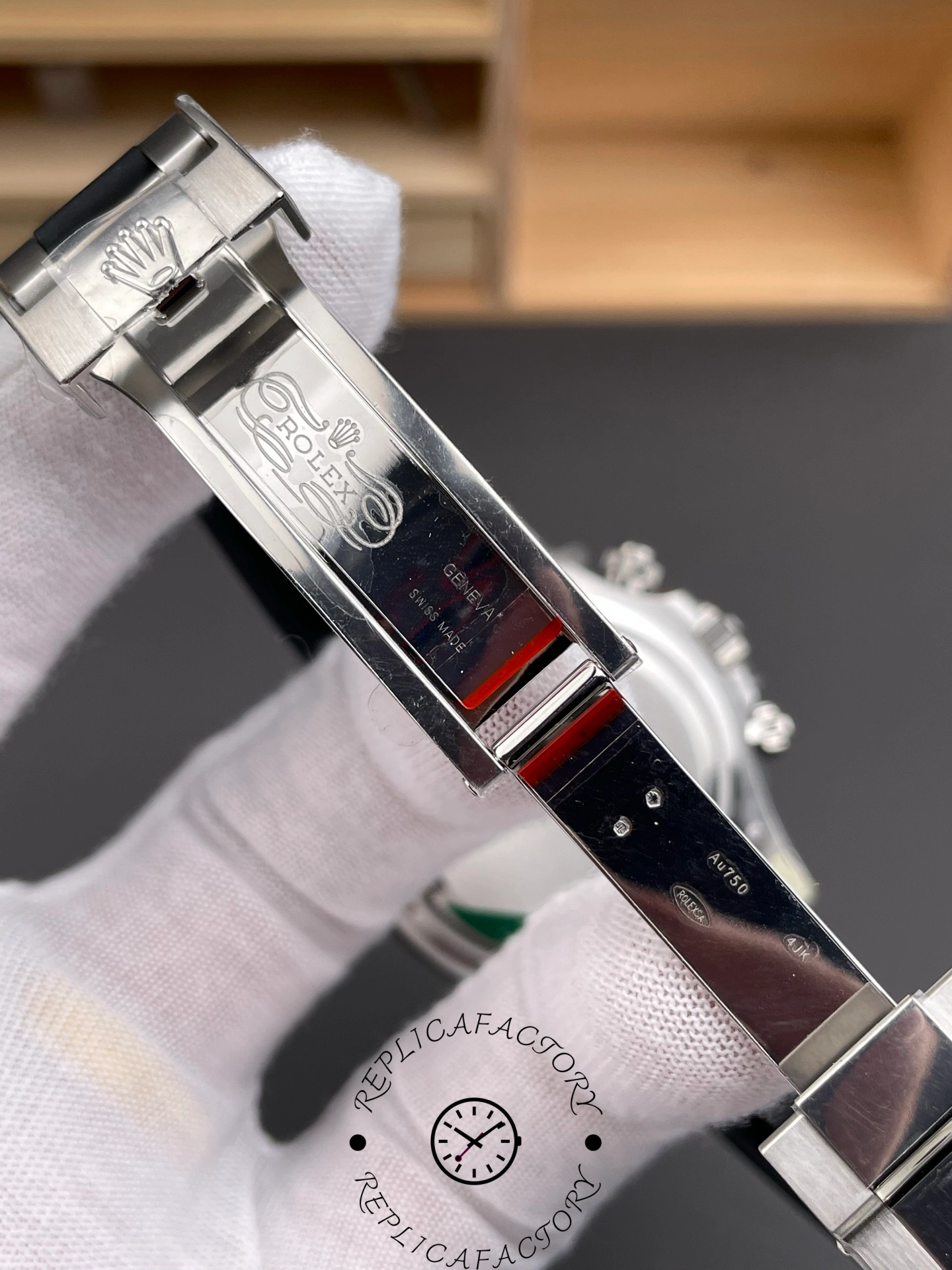 Inside clasp of Rolex Daytona 126519LN showing Rolex Geneva engravings on polished steel.