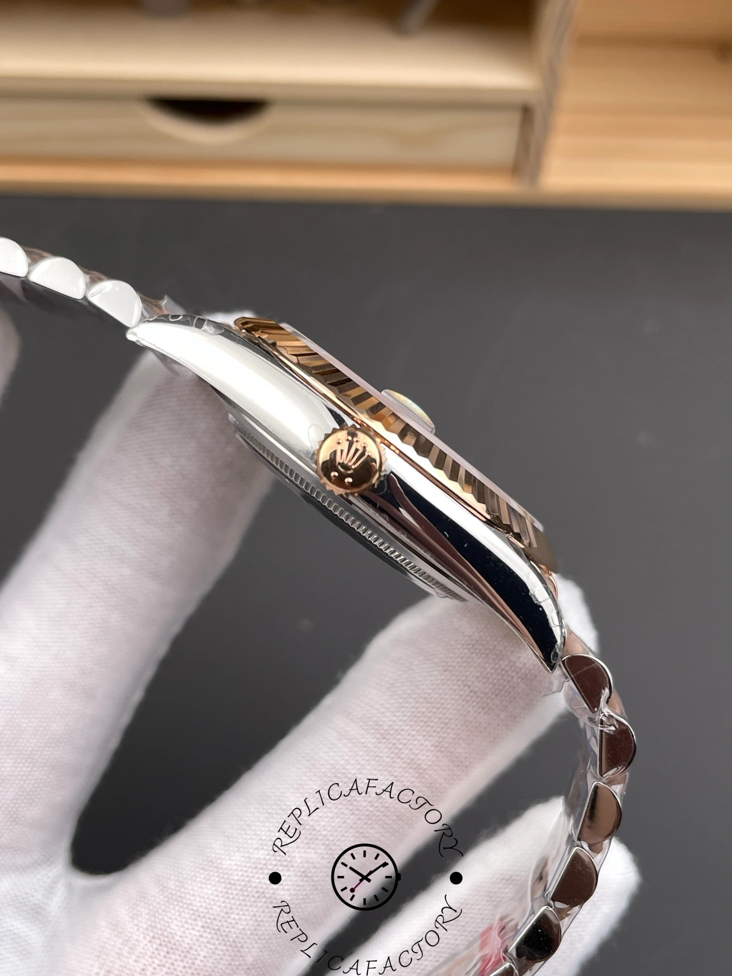 Side view of Rolex Datejust 41 m126331-0016 showing crown with Rolex logo.