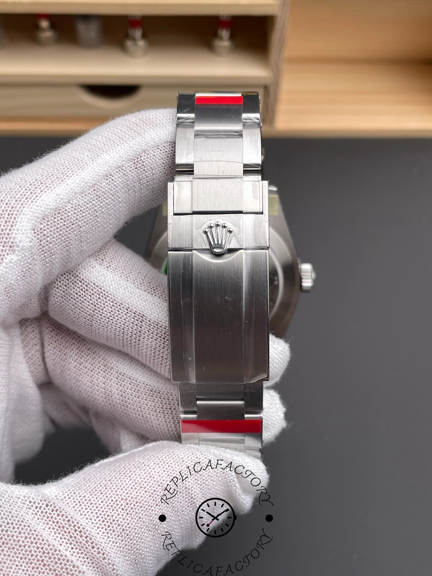 Rear clasp of Rolex Explorer 224270 with engraved crown logo on brushed steel.