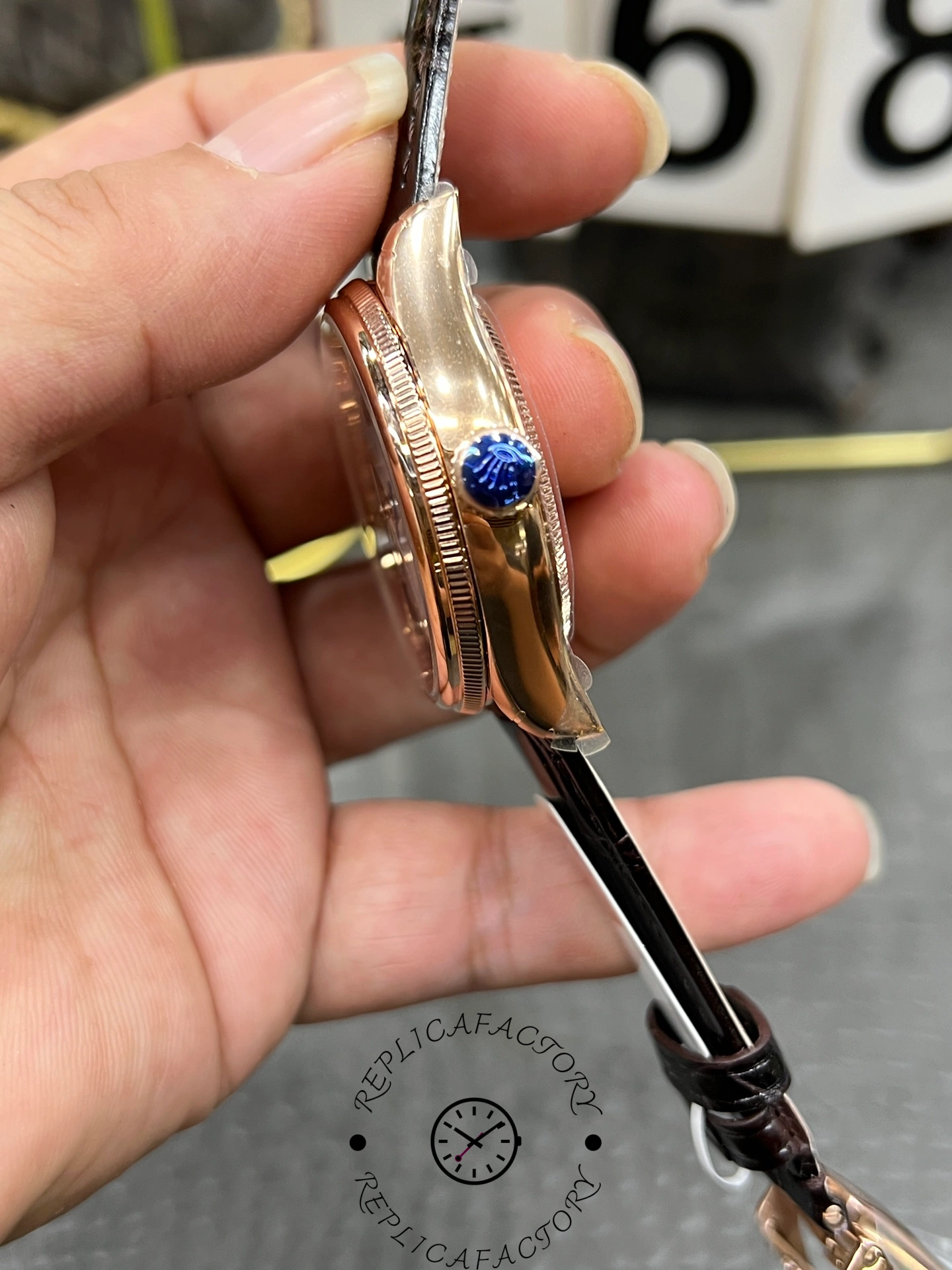 Crown side of Rolex Cellini 50535 featuring Rolex emblem on rose gold crown.