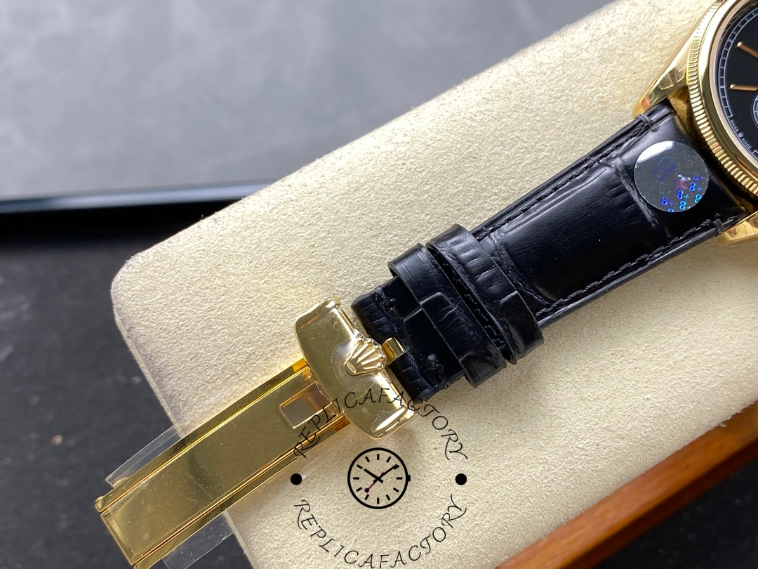 Clasp of Rolex Perpetual 1908 52508-0002 showing gold buckle with Rolex logo.