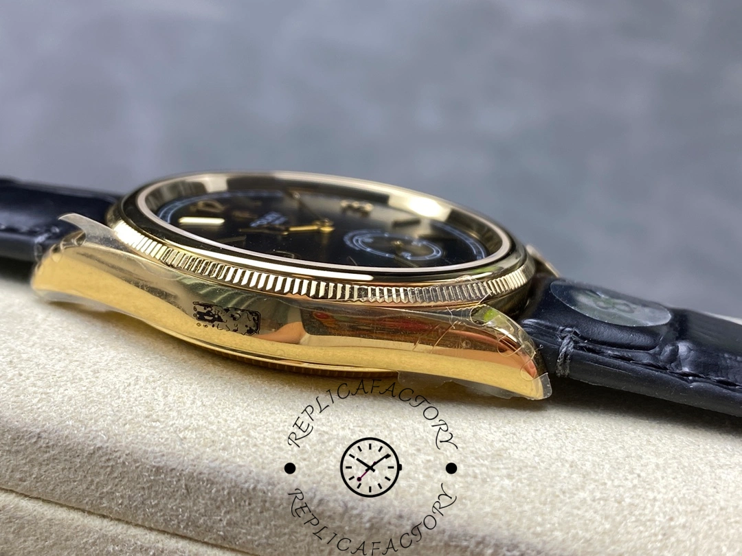 Side angle of Rolex Perpetual 1908 52508-0002 showing gold lugs and case curvature.
