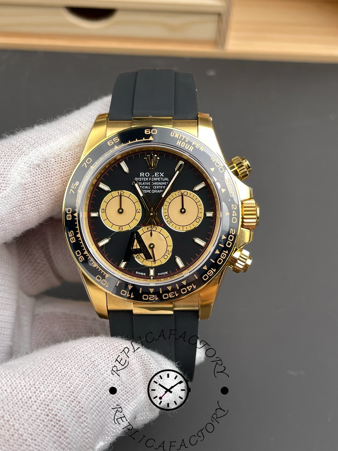 Front view of Rolex Cosmograph Daytona 126518LN 40mm showing black and gold dial with ceramic bezel.