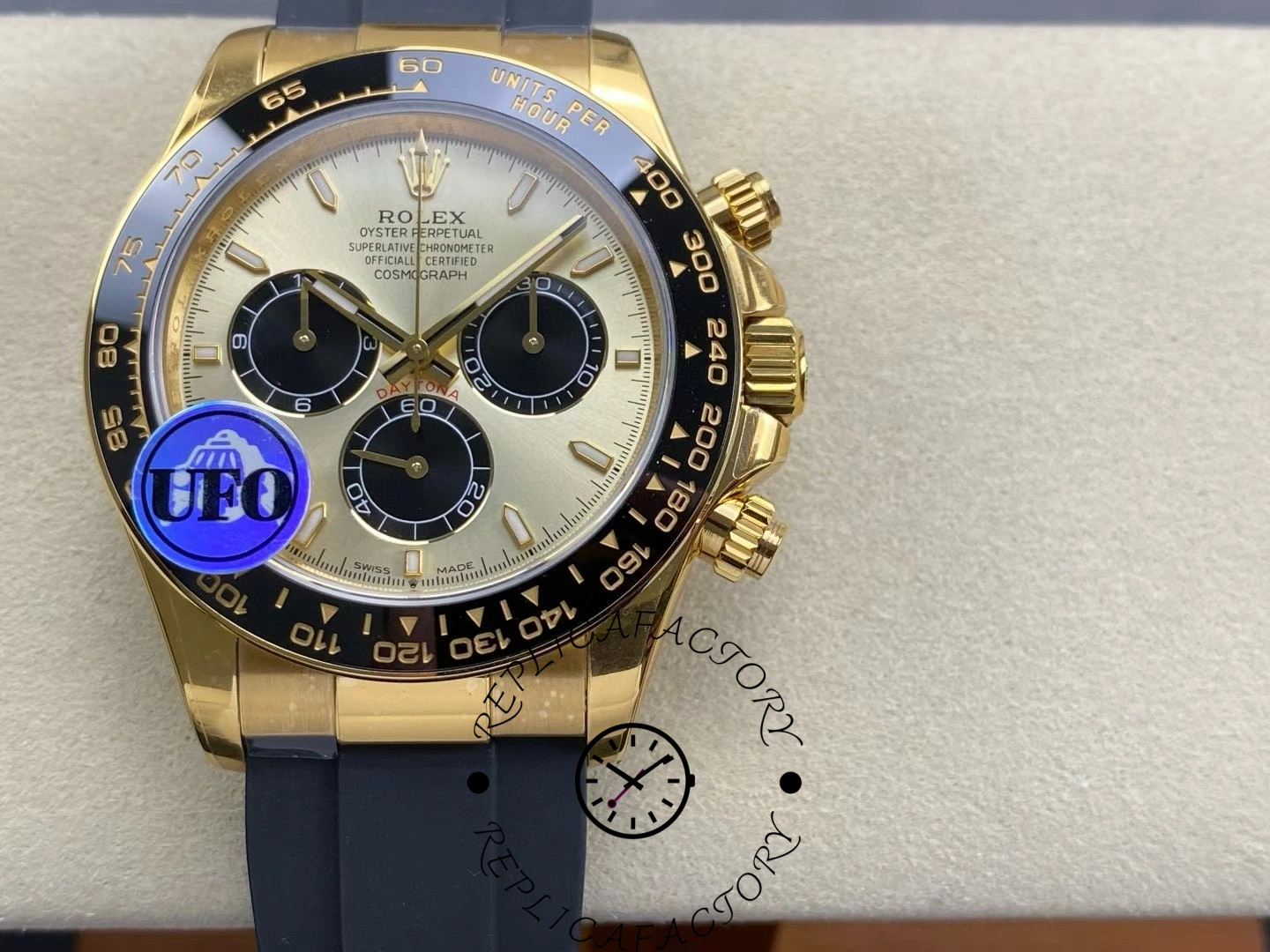 Front view of Rolex Cosmograph Daytona 126518LN in yellow gold with black Oysterflex strap.