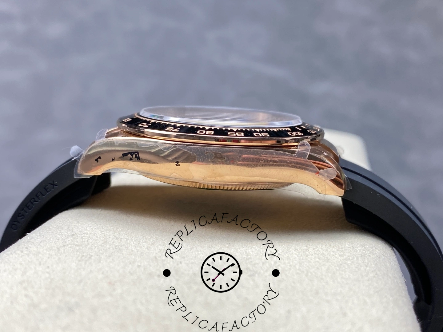 Left side profile of Rolex Daytona 126515LN emphasizing curved case design.