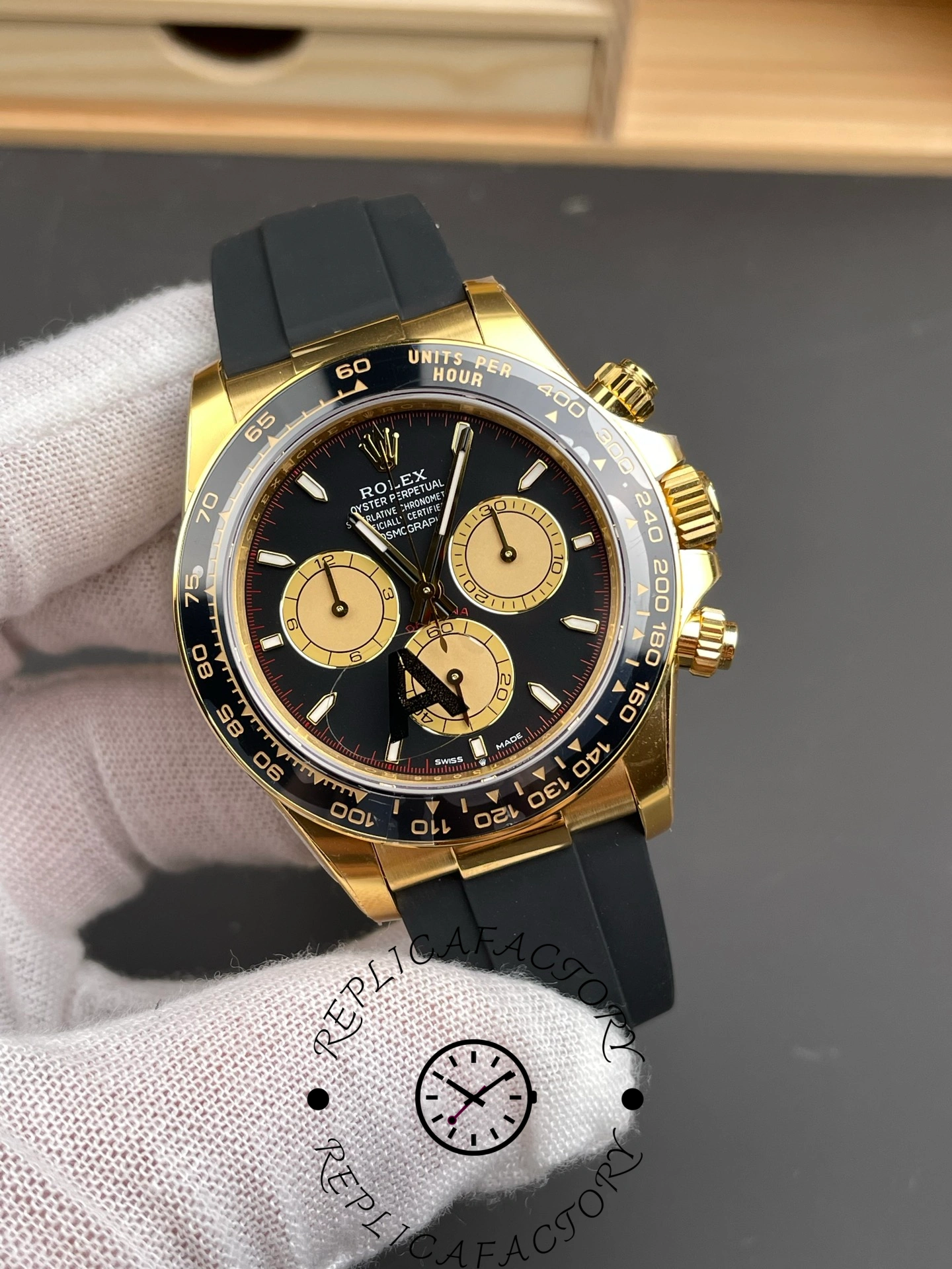 Angled view of Rolex Daytona 126518LN highlighting the gold case and chronograph subdials.