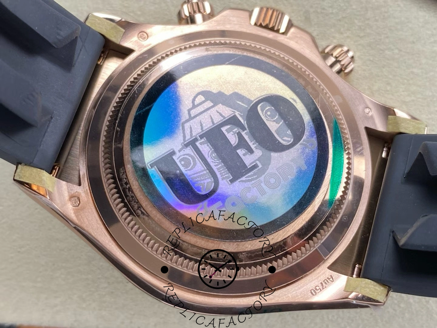 Case back of Rolex Cosmograph Daytona 126515LN with holographic UFO Factory sticker.