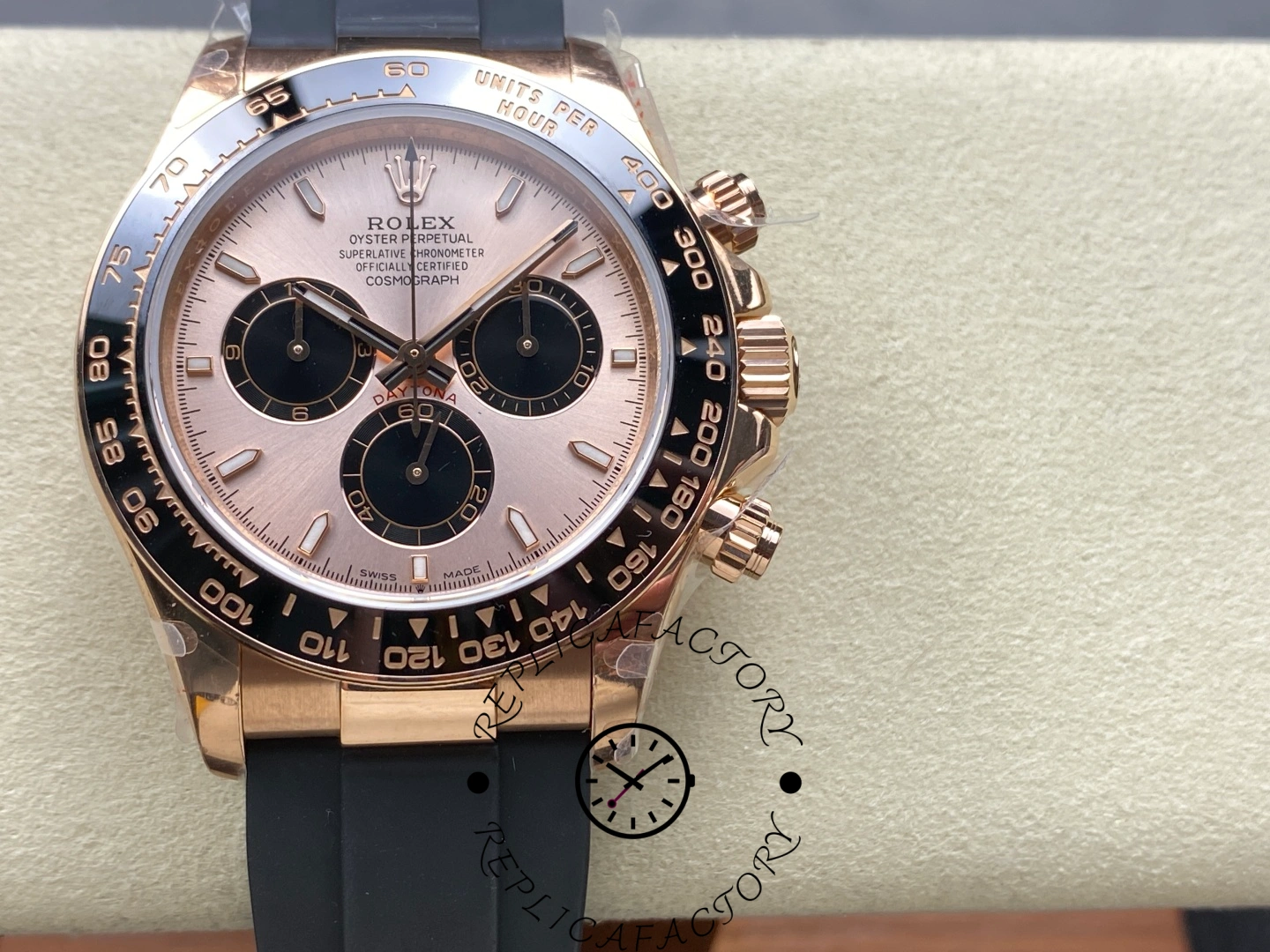 Front view of Rolex Cosmograph Daytona 126515LN showing the rose gold dial, black subdials, and ceramic bezel.