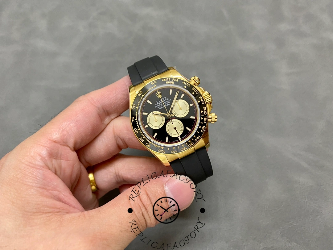 Full wrist shot of Rolex Daytona 126518LN held in hand, showing entire front dial.