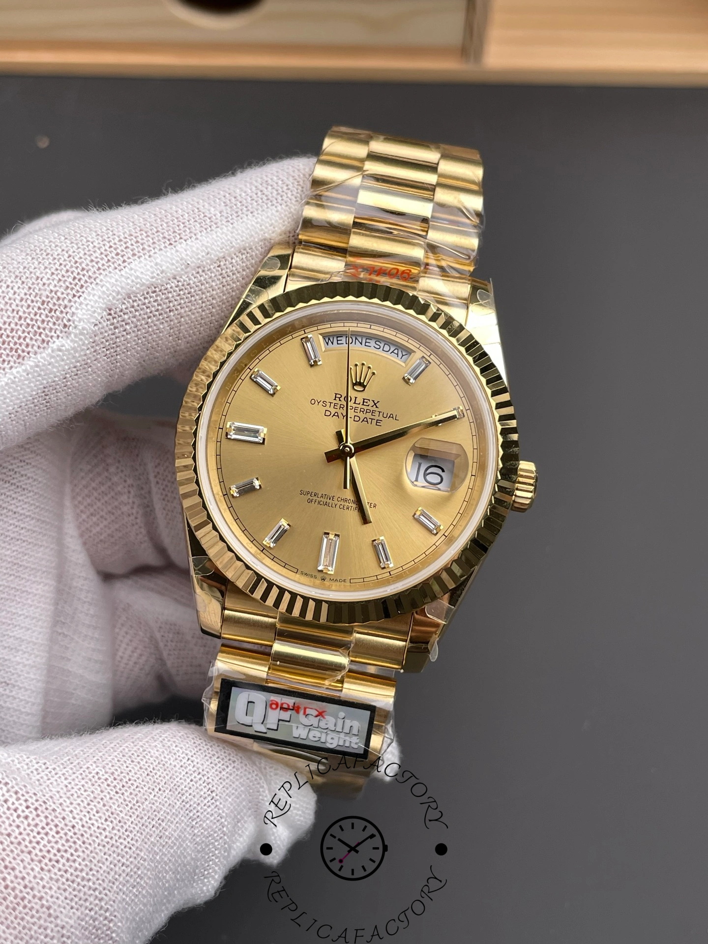 Rolex Day-Date 40 m228238-0005 front shot with visible Wednesday and date window.