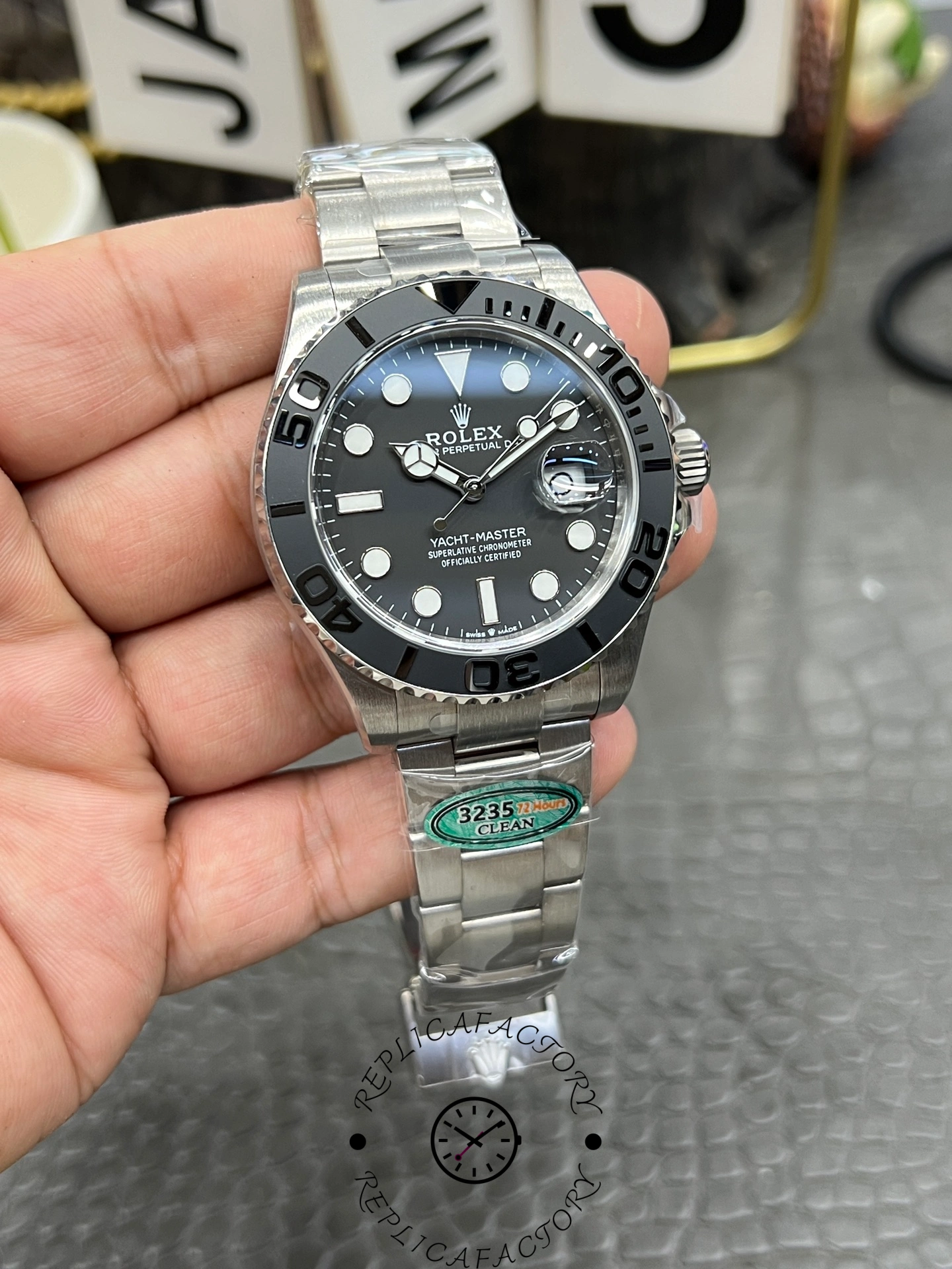 Close-up of Rolex Yacht-Master 42 226627-0001 dial and hands, showing brushed finish.