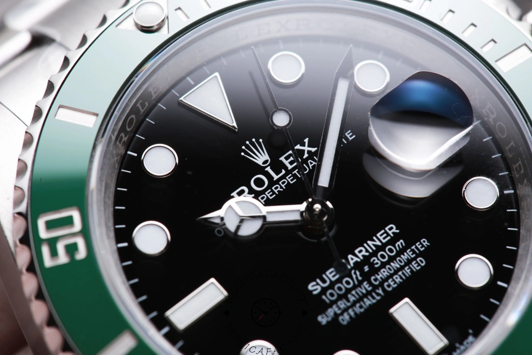 Macro shot of Rolex Submariner 126610LV dial showing logo and hands detail.