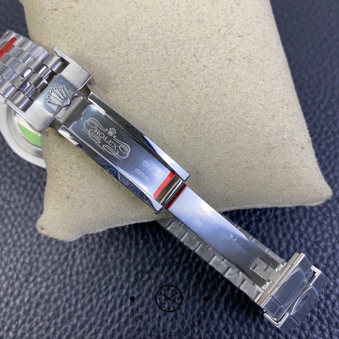 Bracelet clasp of Rolex Submariner 116610LV showing Rolex crown engraving.