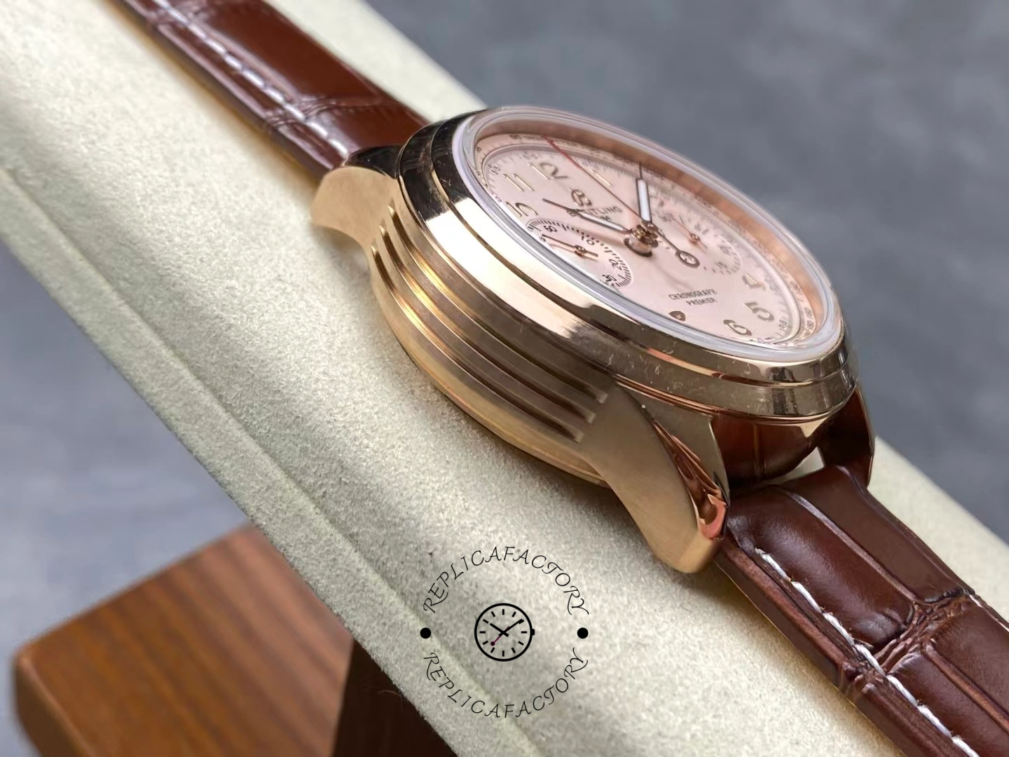 Left side profile of polished rose gold case on Breitling Premier B09 RB0930371G1P1.