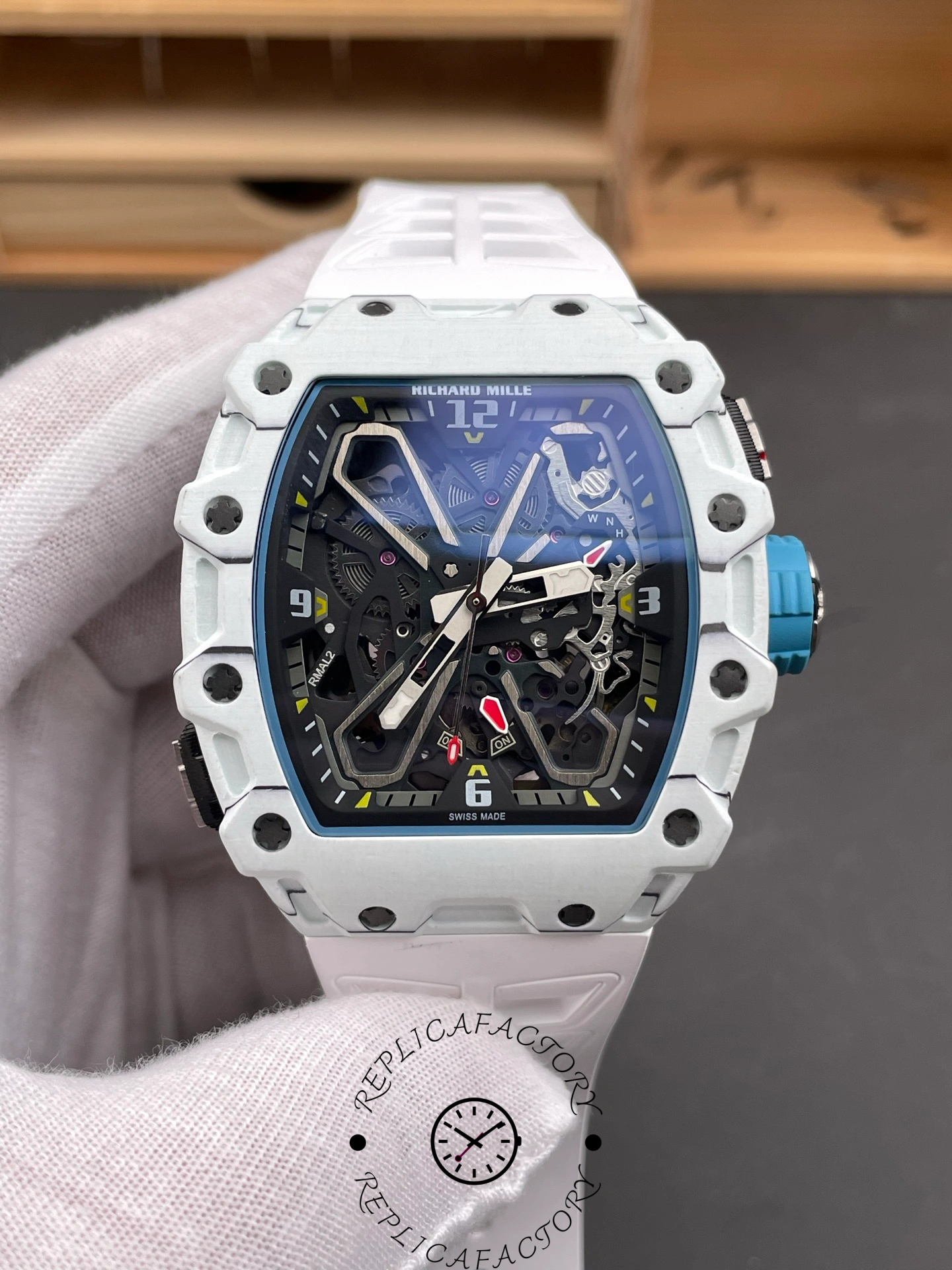 Omega Richard Mille RM 35-03 Rafa Nadal on wrist with white rubber strap and carbon case.