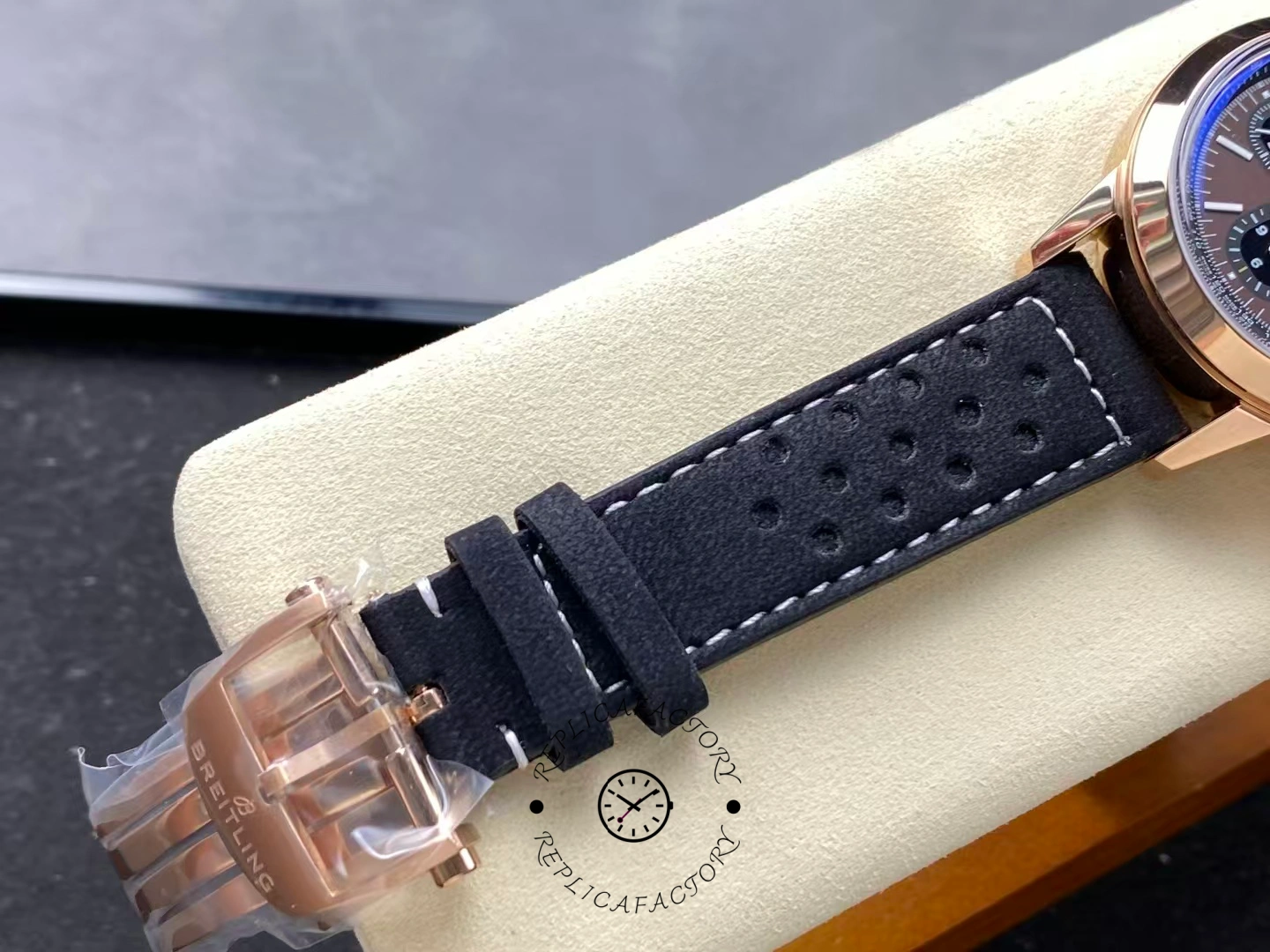 Rear strap and buckle view of Breitling Top Time B01 RB01761A1Q1X1 in rose gold.