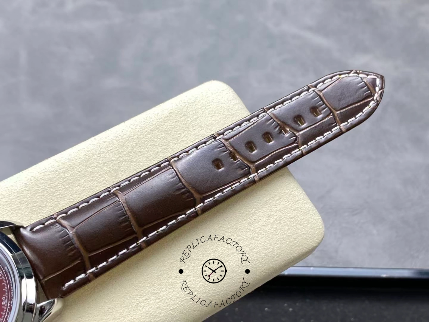 Brown alligator leather strap of Breitling Premier B09 Chronograph AB0930D41K1P1.
