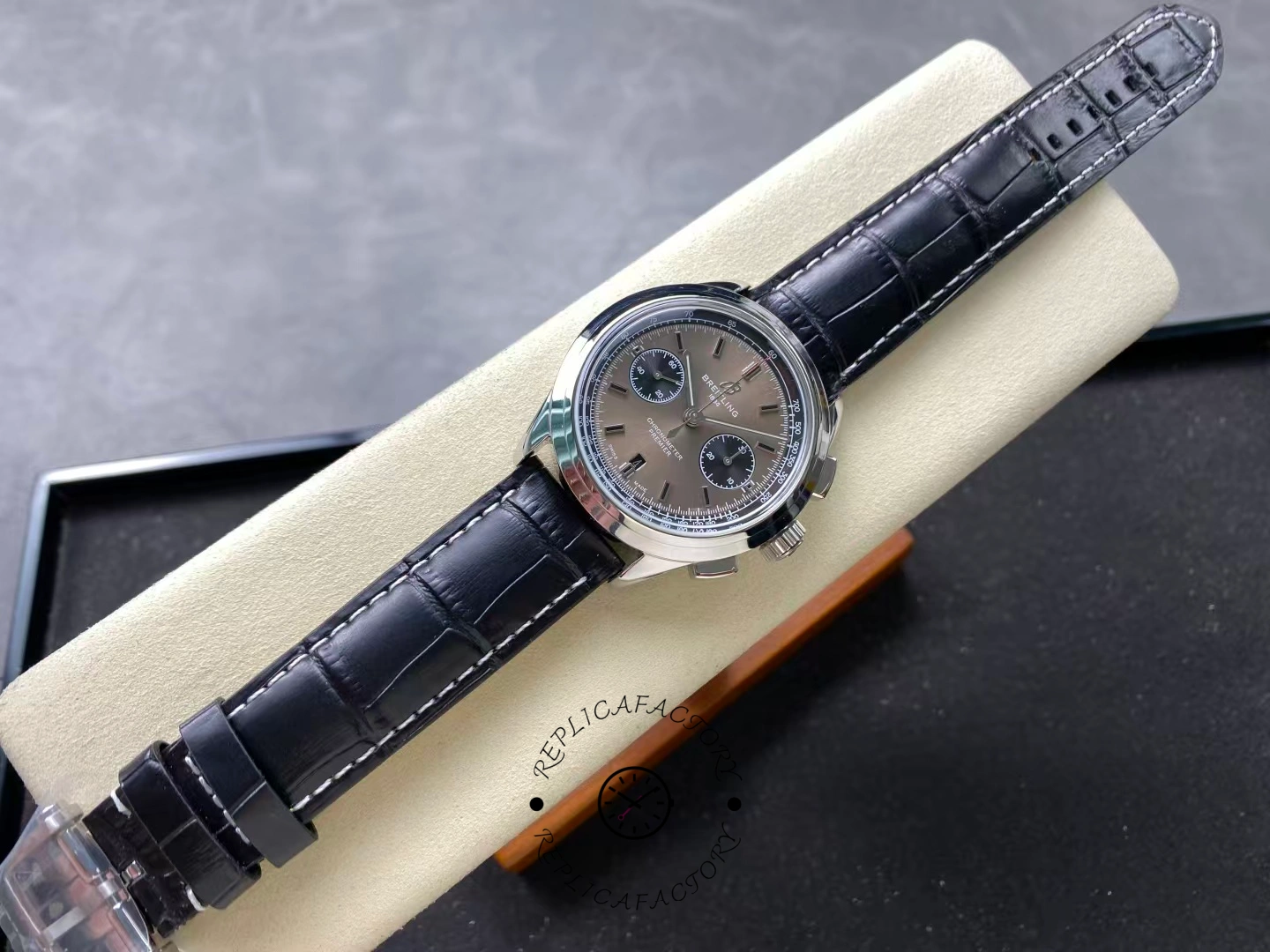 Full view of Breitling Premier B01 AB0118221B1P2 grey dial watch with black leather strap.