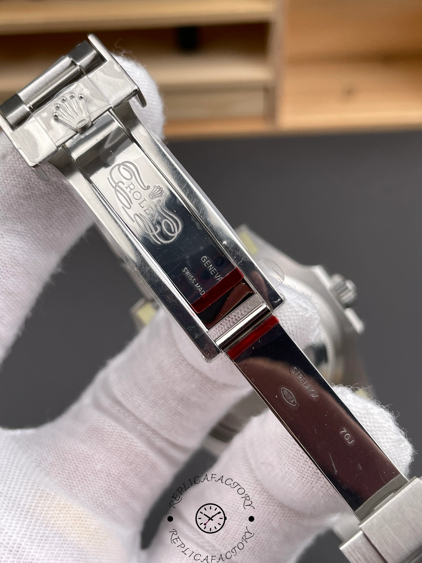 Inside clasp of Rolex Submariner Date 126610LN showing engraved Rolex markings.