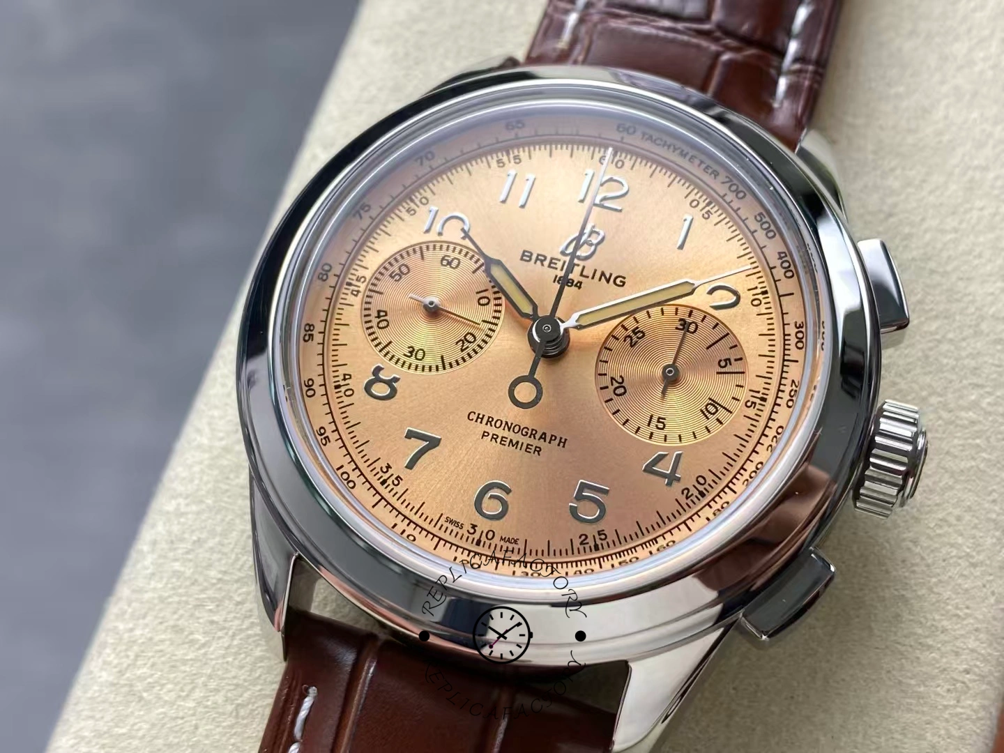 Angled close-up of Breitling Premier B09 Chronograph 40 AB0930F51H1P1 champagne dial in focus.