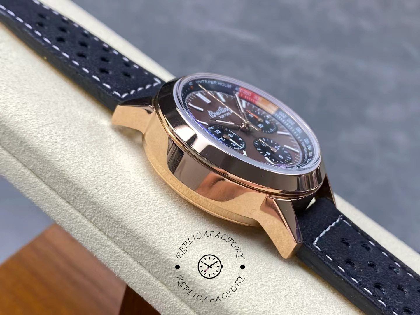 Left side case view of Breitling Top Time B01 RB01761A1Q1X1 with polished rose gold finish.