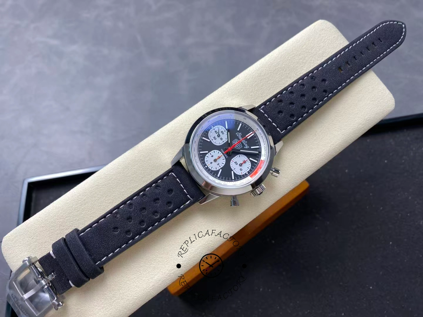 Full view of Breitling Top Time B01 Deus Chronograph AB01765A1B1X1 with black strap.