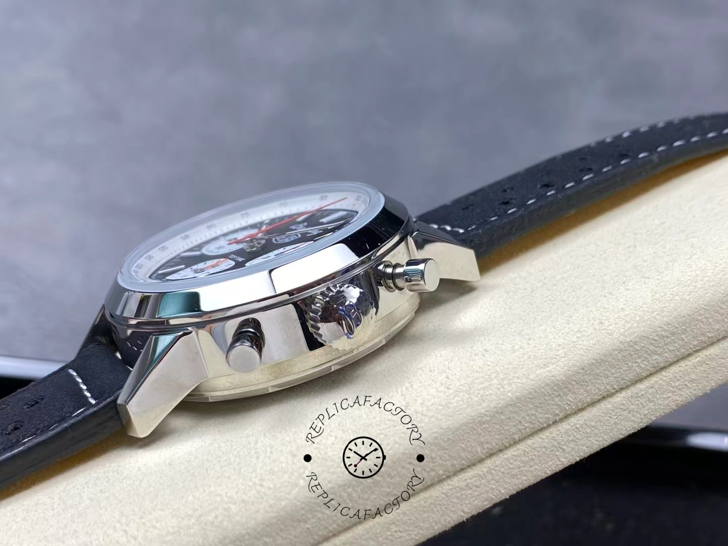 Side view showing crown and pushers of Breitling Top Time B01 Deus Chronograph AB01765A1B1X1.