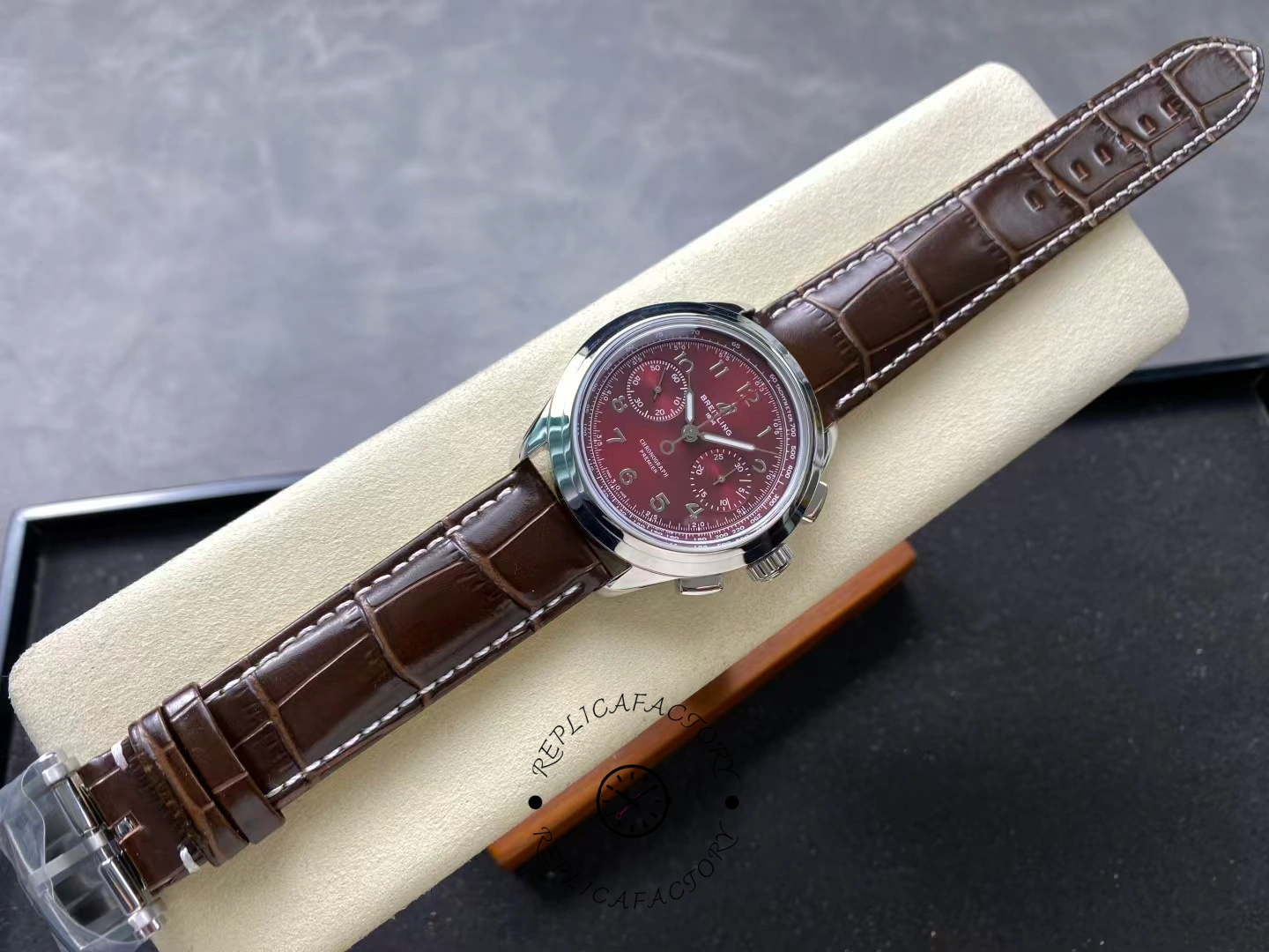 Full view of Breitling Premier B09 Chronograph AB0930D41K1P1 with brown alligator strap.