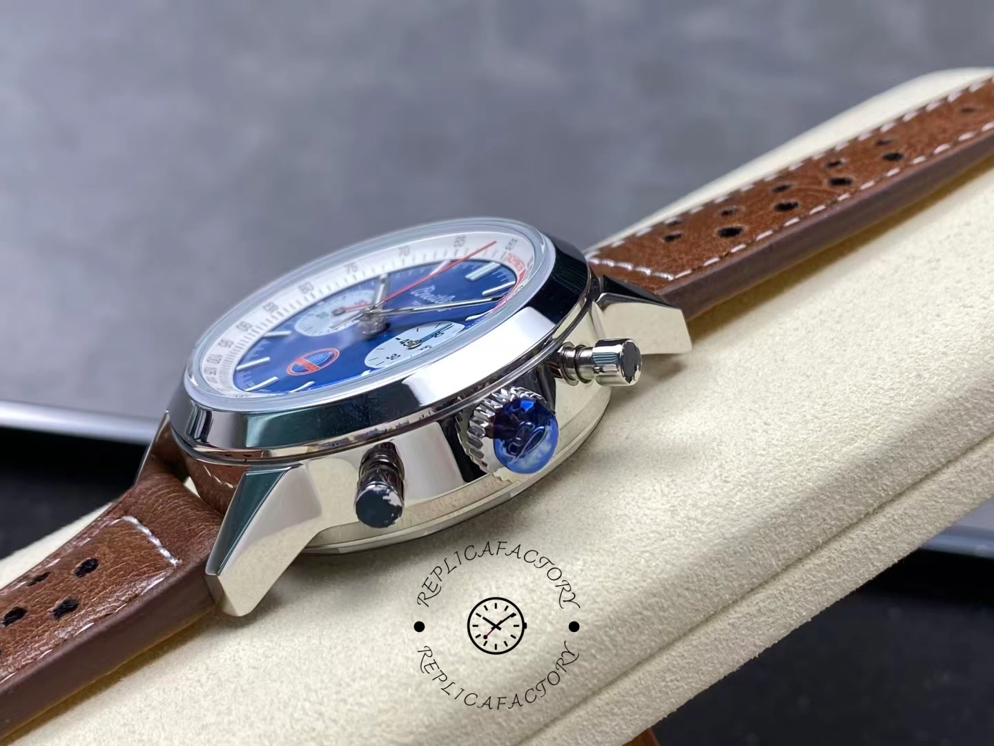 Side view showing crown and pushers of Breitling Top Time B01 Shelby Cobra AB01763A1C1X1.