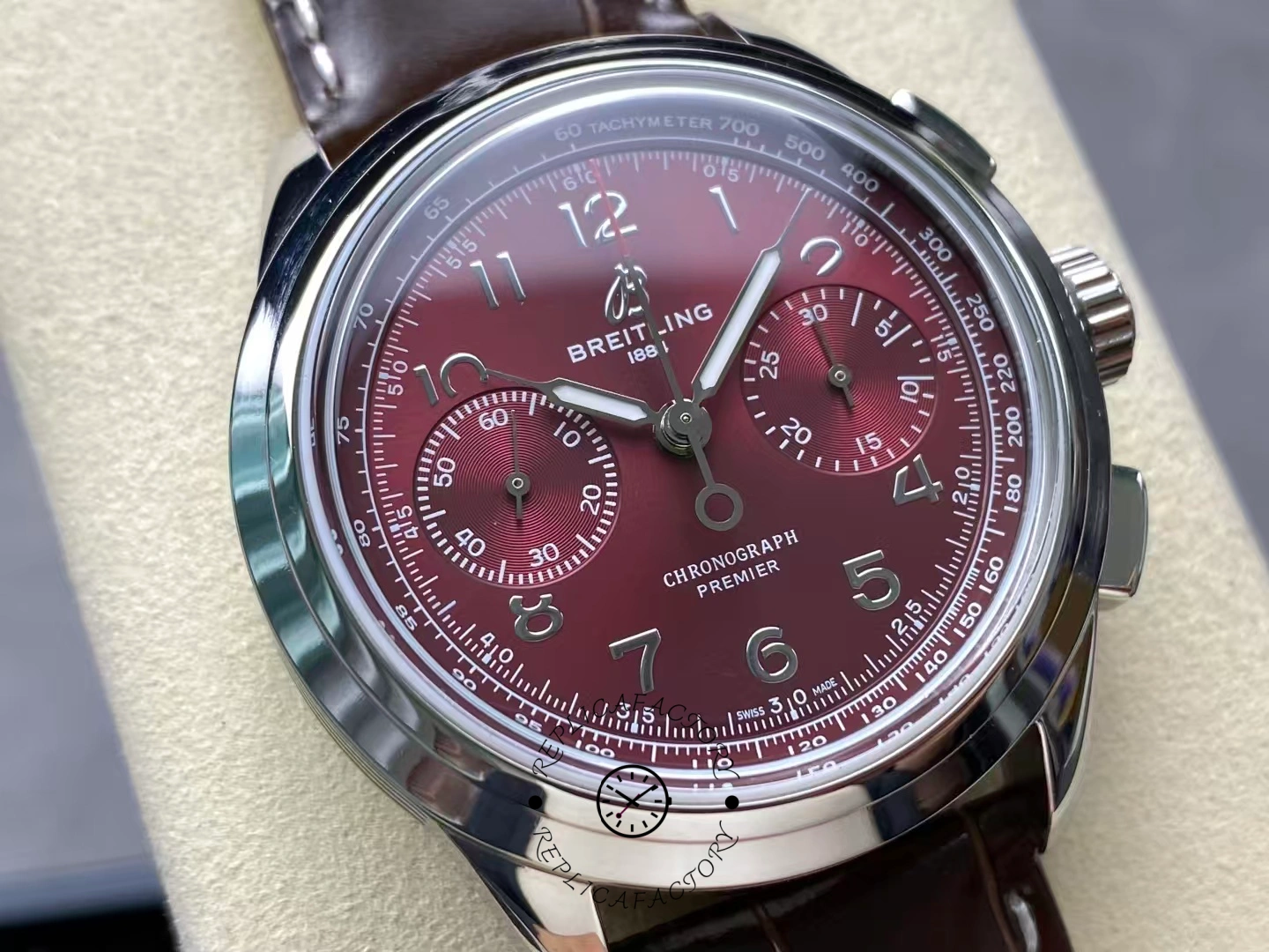 Close-up of red dial subdials on Breitling Premier B09 Chronograph AB0930D41K1P1.