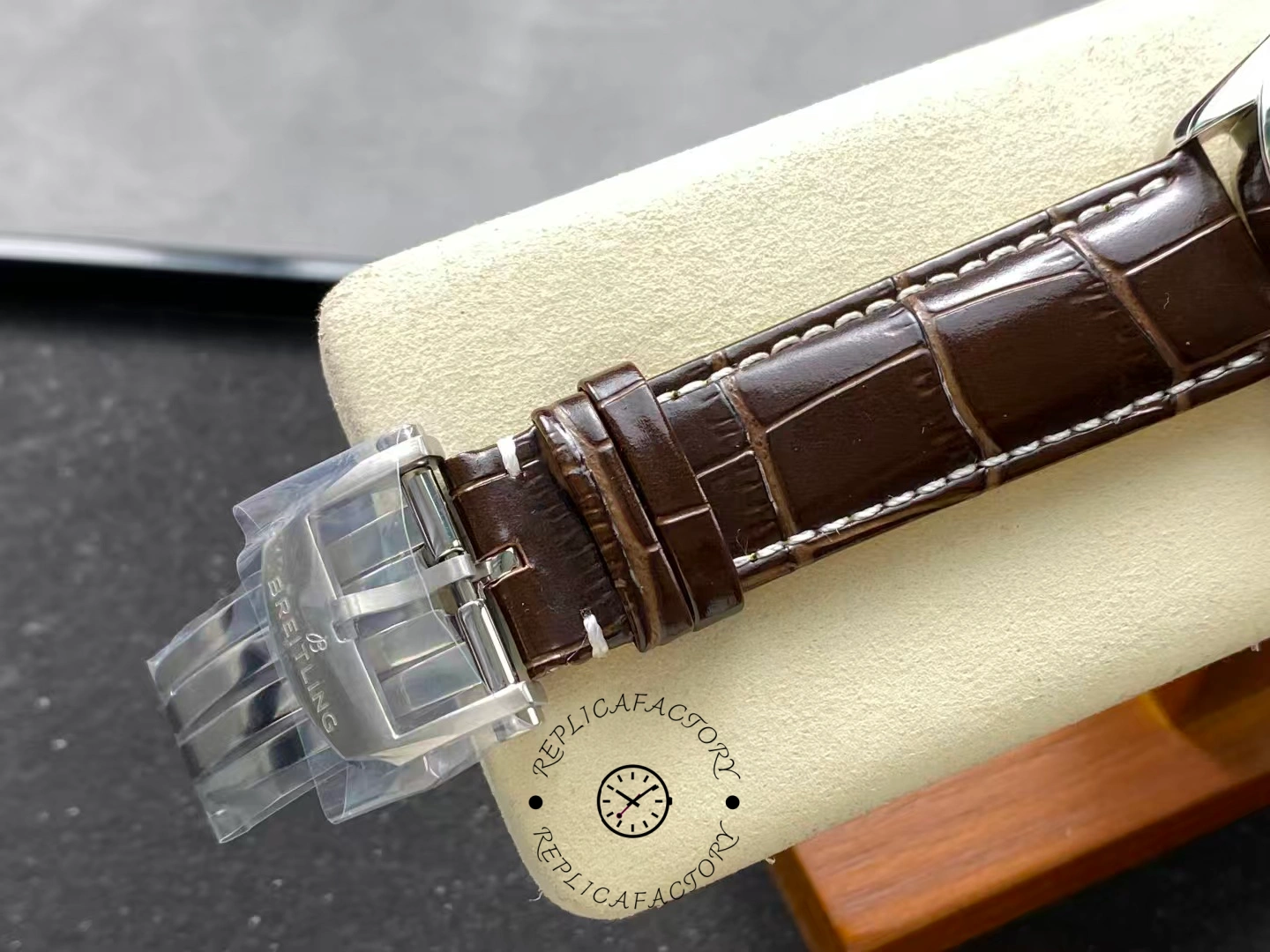 Buckle detail of Breitling Premier B09 Chronograph AB0930D41K1P1 showing clasp engraving.